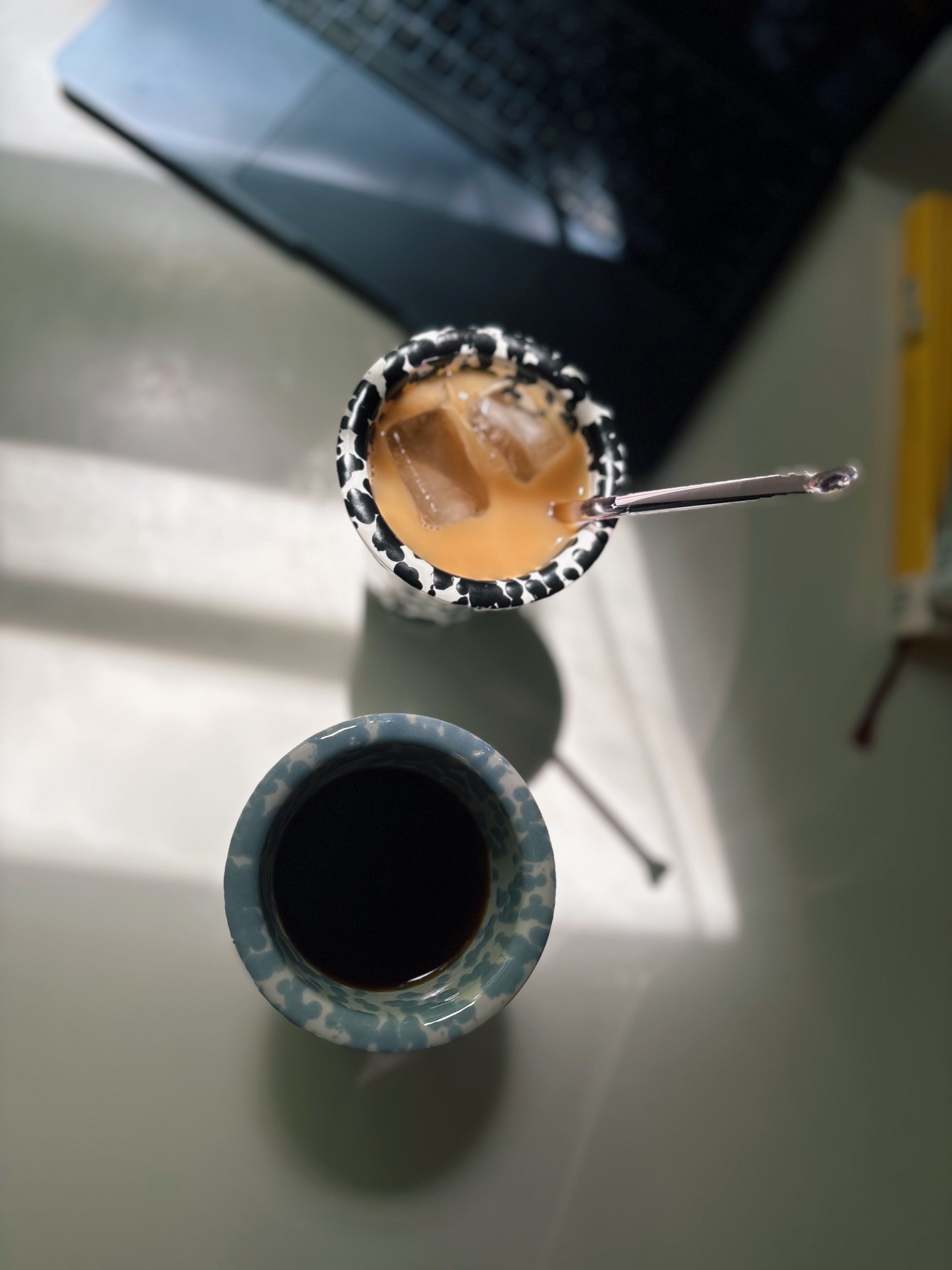 blue and black coffee cup