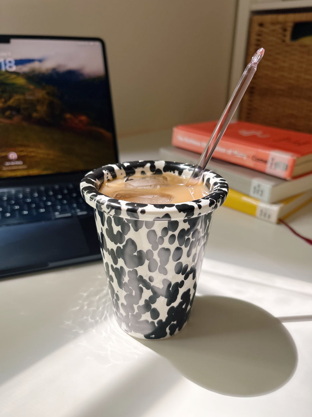 coffee in a black splash marble cup