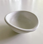 White ceramic bowl on a white background